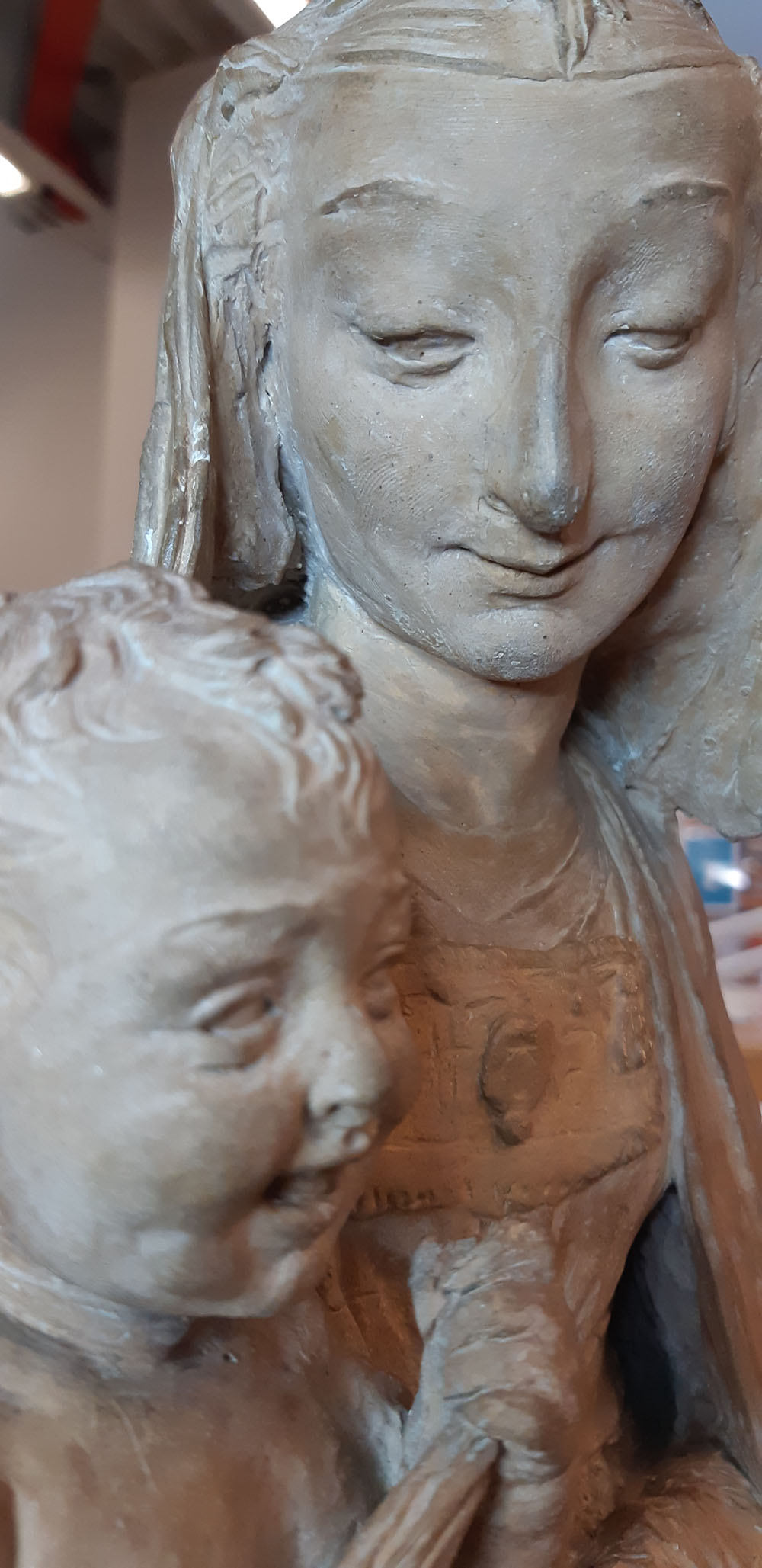 A statue of a woman and child