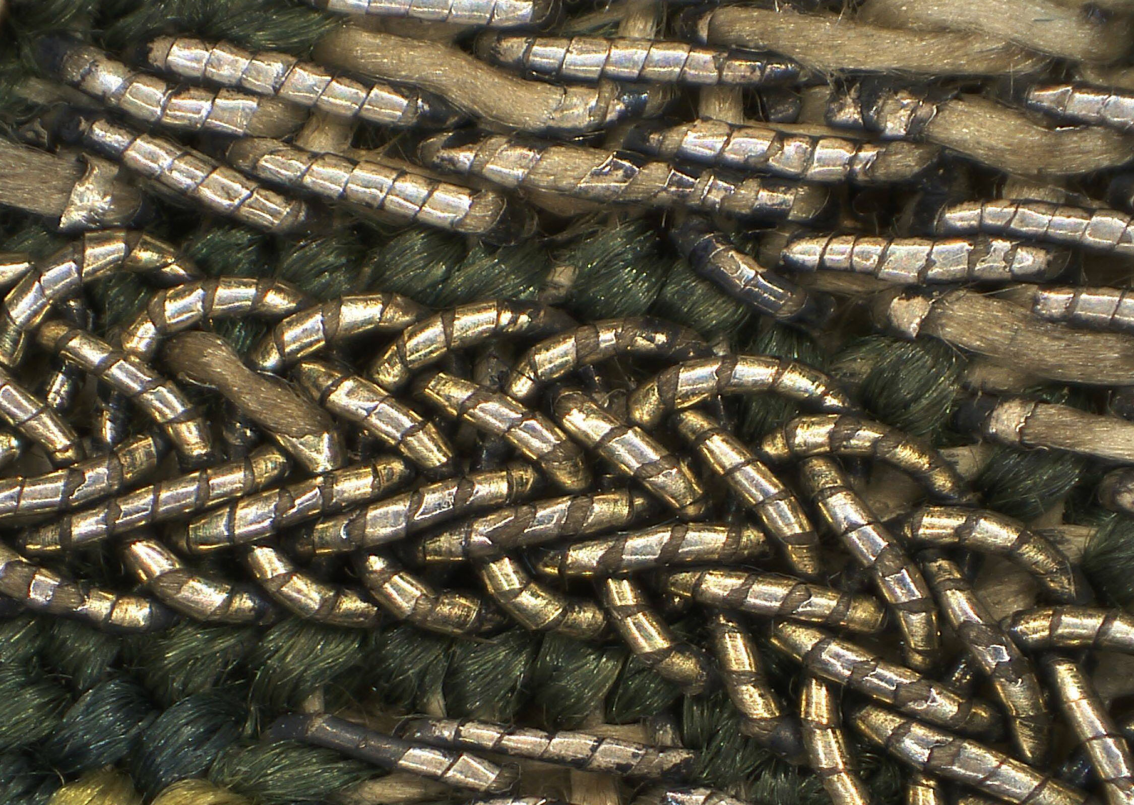 Microscopic detail of gold thread